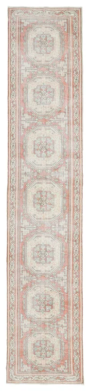 Full overhead view of the 2'10" x 14'10" vintage Anatolian runner rug with rose and ivory geometric patterns