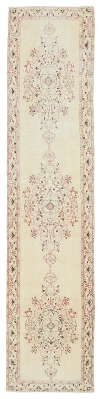 Full overhead view of the ivory and rose floral medallion vintage runner rug