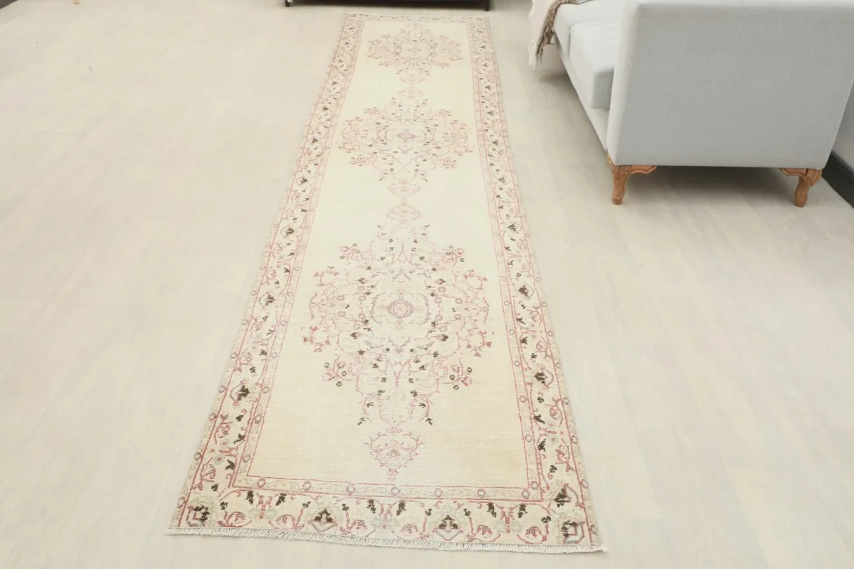 Overhead view of the vintage runner rug laid out in a room