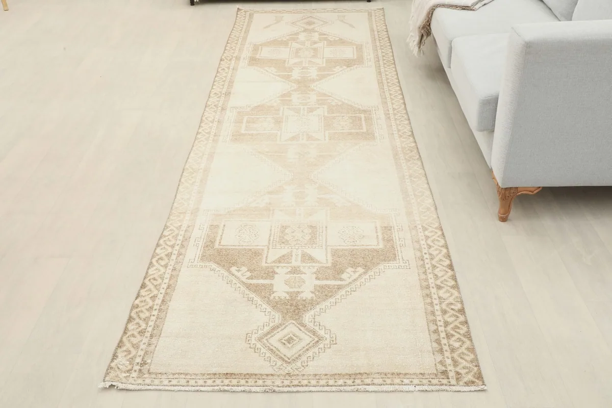 Full overhead view of the runner rug in a room, capturing its entire length and design