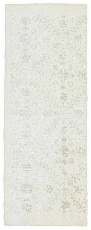 Full overhead view of the 1'10" x 5'2" vintage Anatolian runner with ivory and beige tones.
