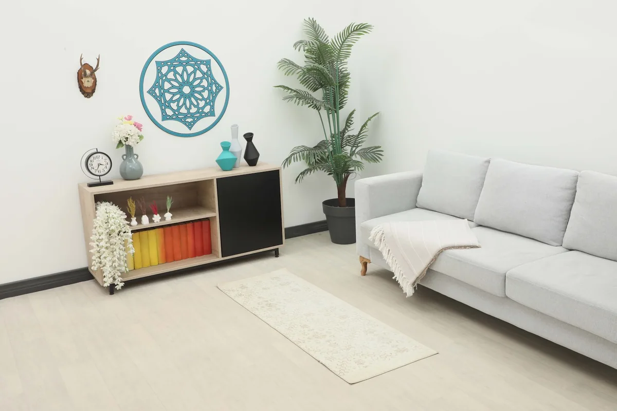 Vintage Anatolian runner in an ivory and beige color palette placed in a modern living room setting.
