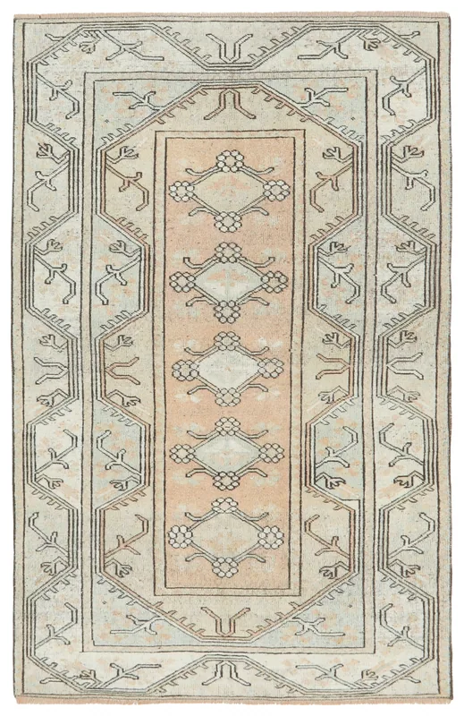 Full overhead view of the 4'0" x 6'3" vintage rose and beige Anatolian rug