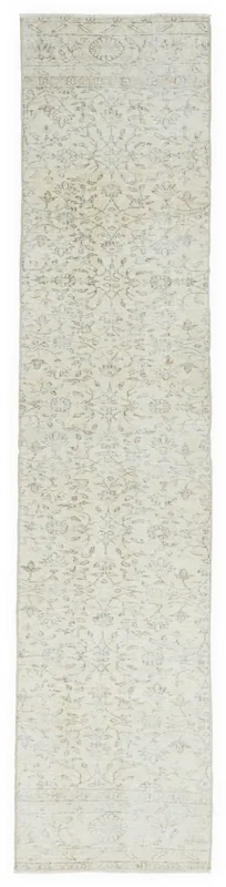 Full top view of the 2x10 vintage Anatolian runner rug with cream and gray botanical patterns