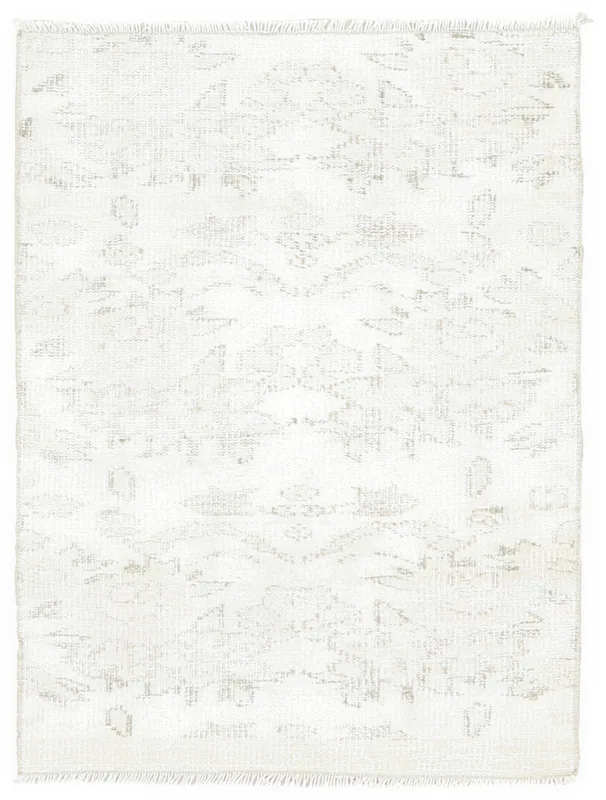 Full overhead view of the 2'7" x 3'8" ivory and beige geometric vintage Anatolian rug on a white background.