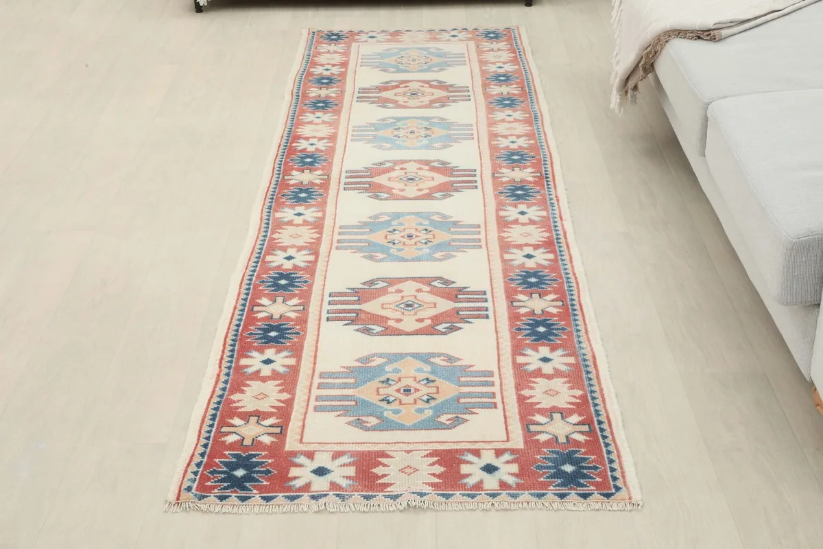 Full overhead view of the runner rug laid out in a room, showcasing its entire pattern