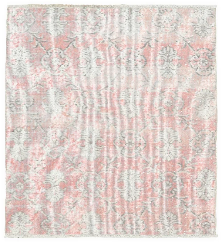 Full overhead view of the rose and gray floral vintage Anatolian rug