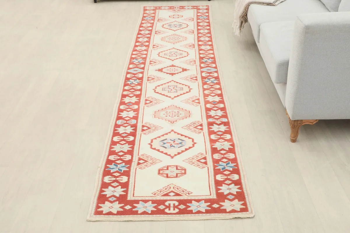 Full room view of the vintage runner rug, highlighting its placement and scale