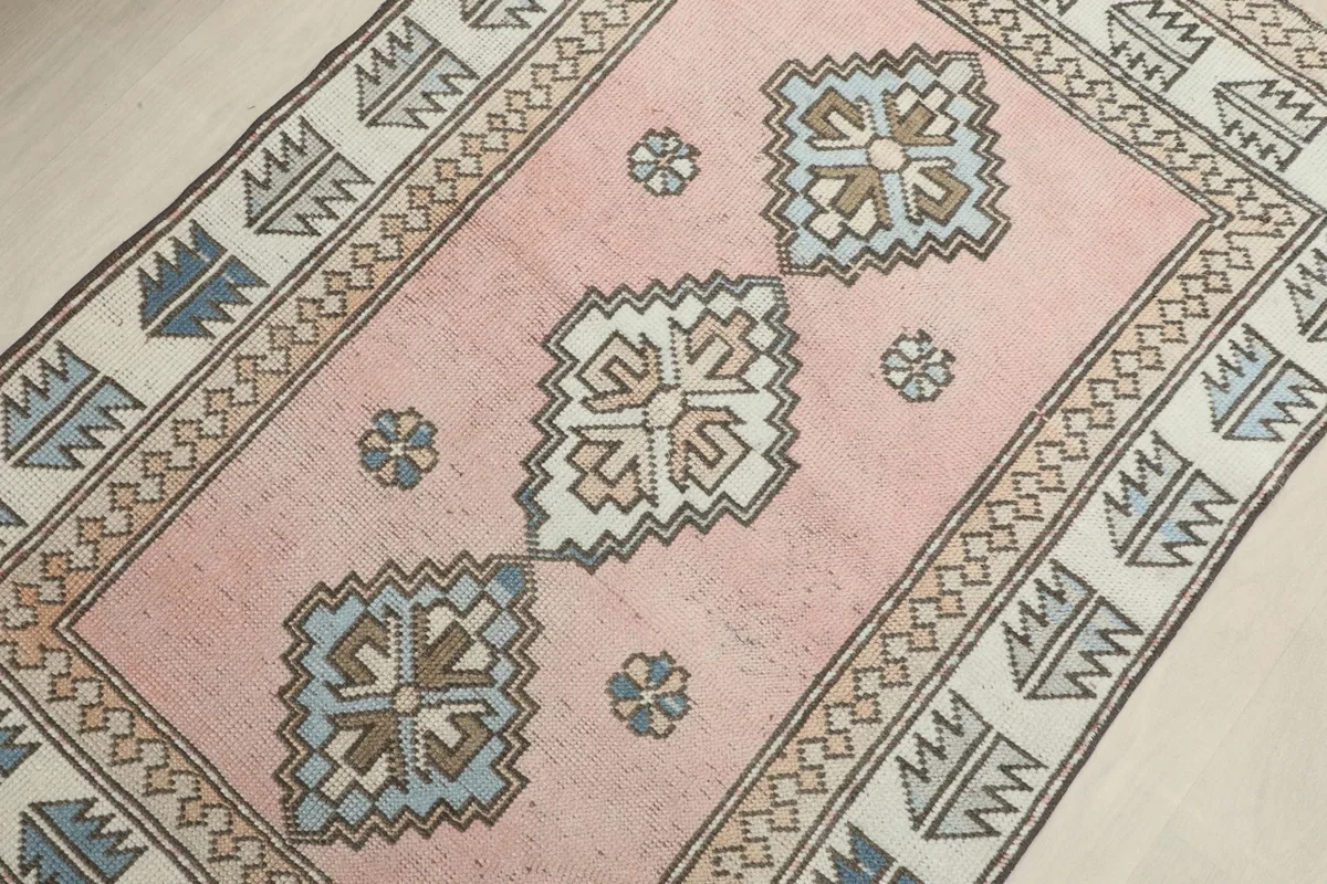 Overhead view focusing on the central medallions and surrounding rose field