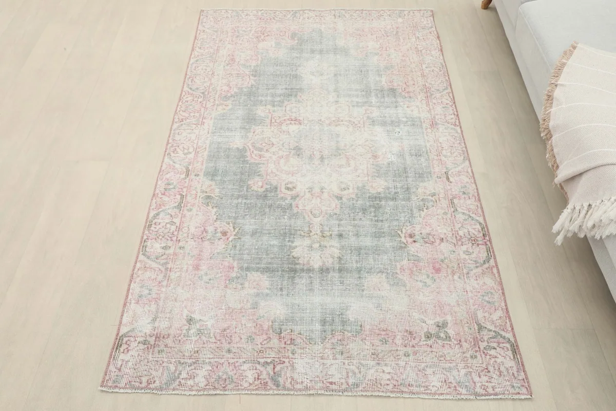 Full view of the Rose Gray Medallion Vintage Rug placed in a room setting