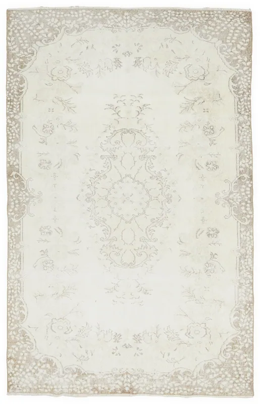 Full overhead view of the 5'9" x 9'7" ivory and beige Anatolian medallion rug on a white background.