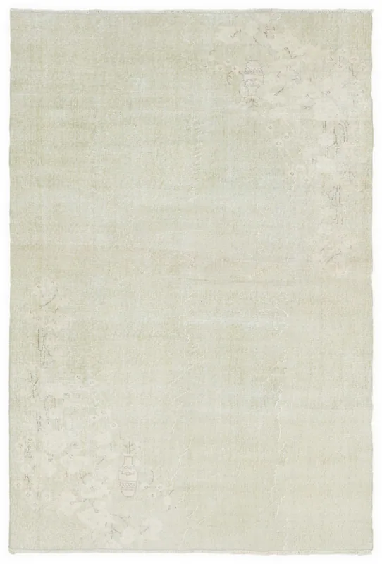 Full top view of the 5'9" x 8'8" cream vintage Anatolian rug on a white background