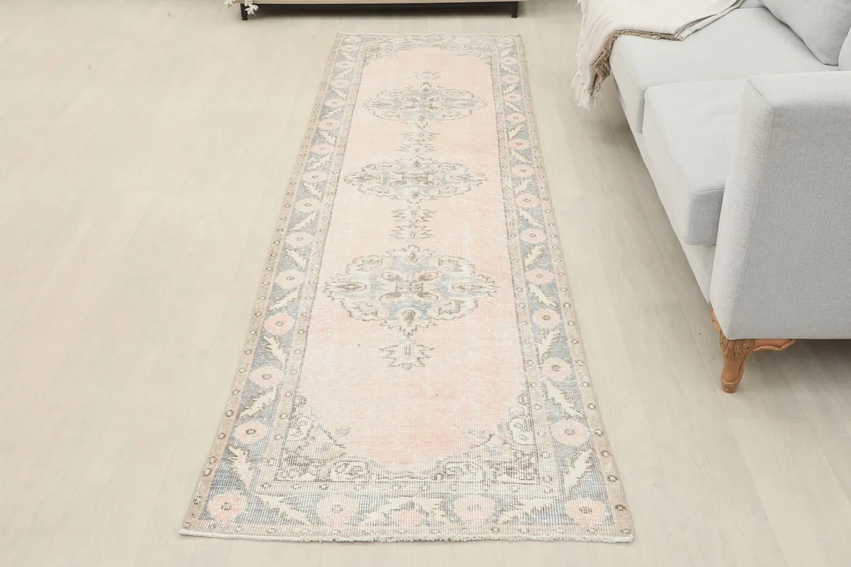 Full view of the runner rug laid out in a room, providing a sense of its scale and design.