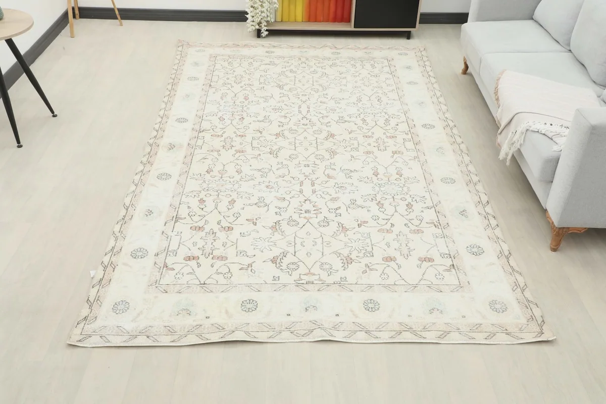 Overhead view of the ivory rug in a room, providing a full perspective of its size and presence.