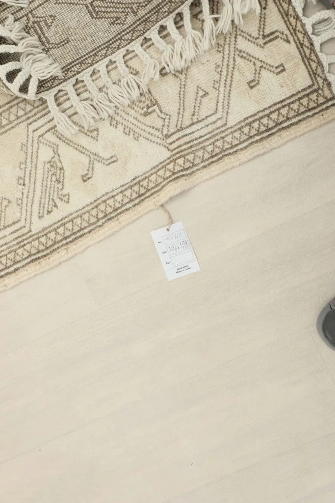 Rug tag attached to the back of the vintage Anatolian rug
