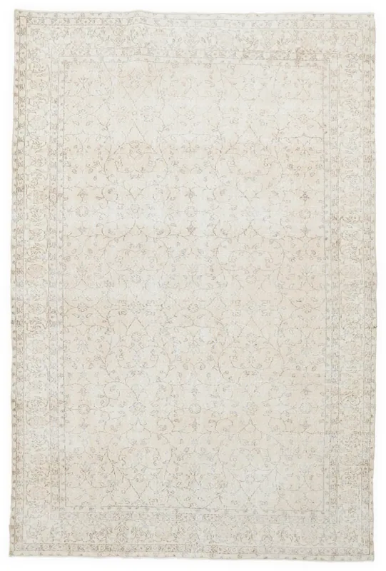 Full overhead view of the ivory and beige vintage Anatolian rug