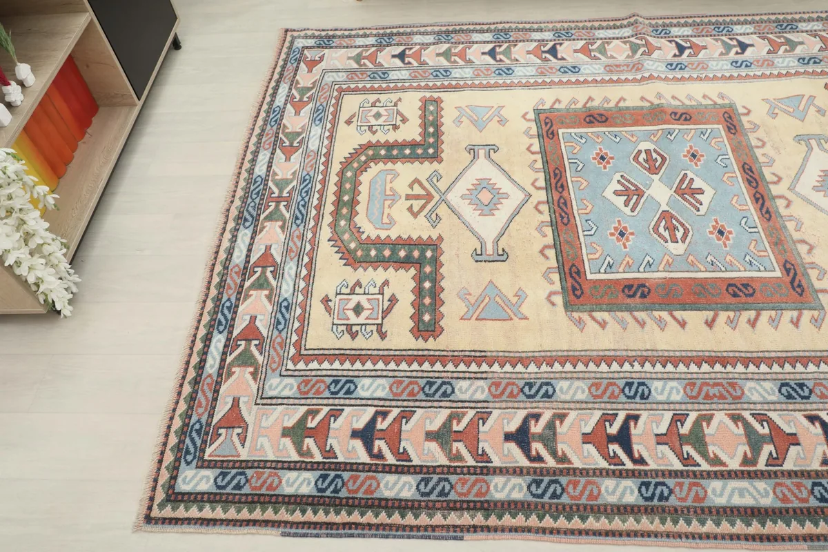 Angled view of the rug's opposite corner, capturing the rich colors and hand-knotted texture.
