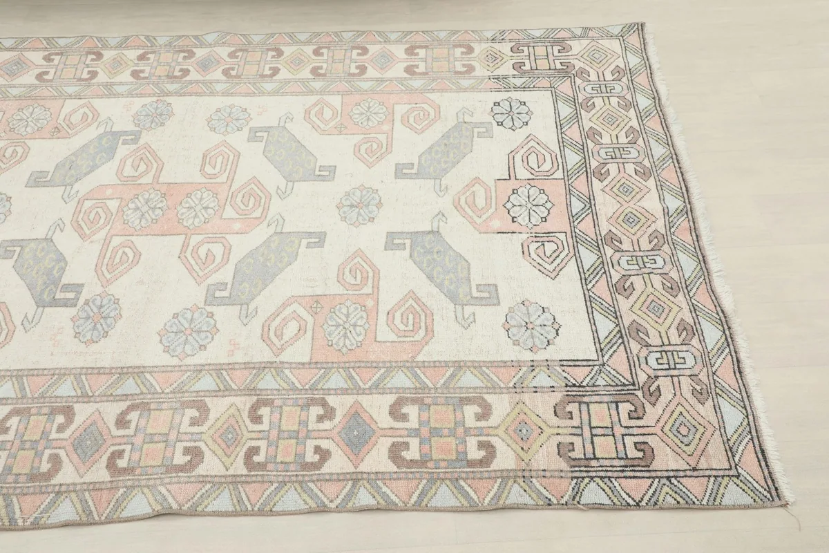 Close-up angled view of the upper right corner of the vintage Anatolian rug