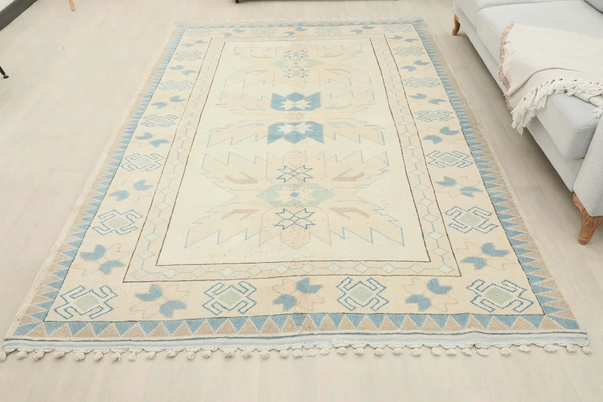 Full room view of the vintage Anatolian rug, providing a sense of its scale and presence