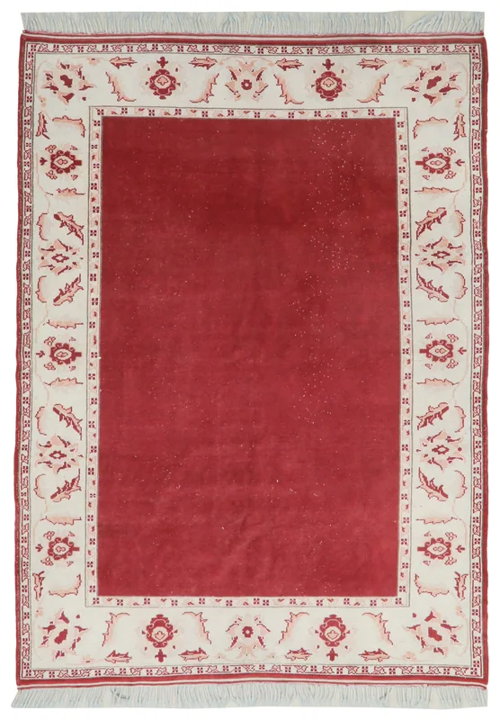 Full top view of the 5'7" x 7'5" red and ivory vintage Anatolian rug with floral border.