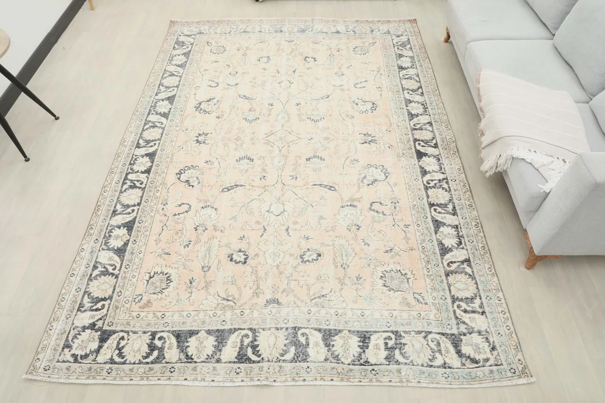 Full overhead view of the 7'1" x 9'8" vintage Anatolian rug in a room setting.