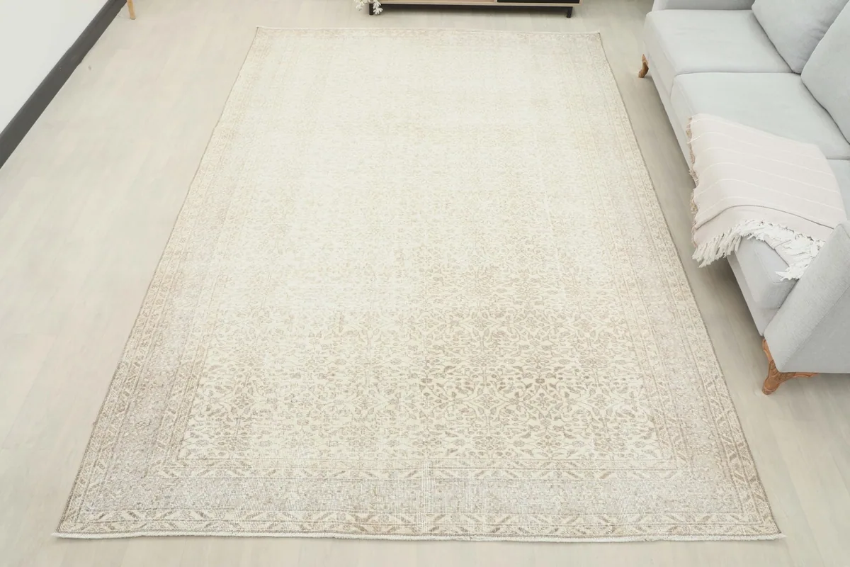Overhead view of the large 7x10 rug in a room, offering a sense of scale and color.