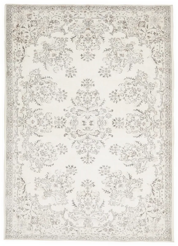 Full overhead view of the 7'5" x 10'5" ivory and gray vintage Anatolian area rug on a white background.