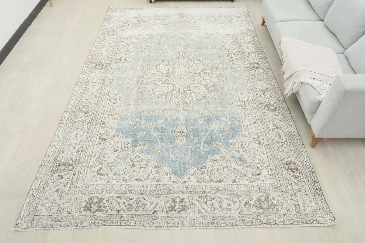Overhead view of the rug in a room, providing a full perspective of its size and design.