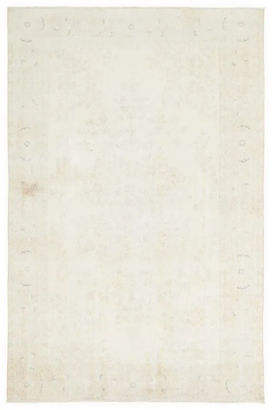 Full overhead view of the ivory and beige vintage Anatolian area rug