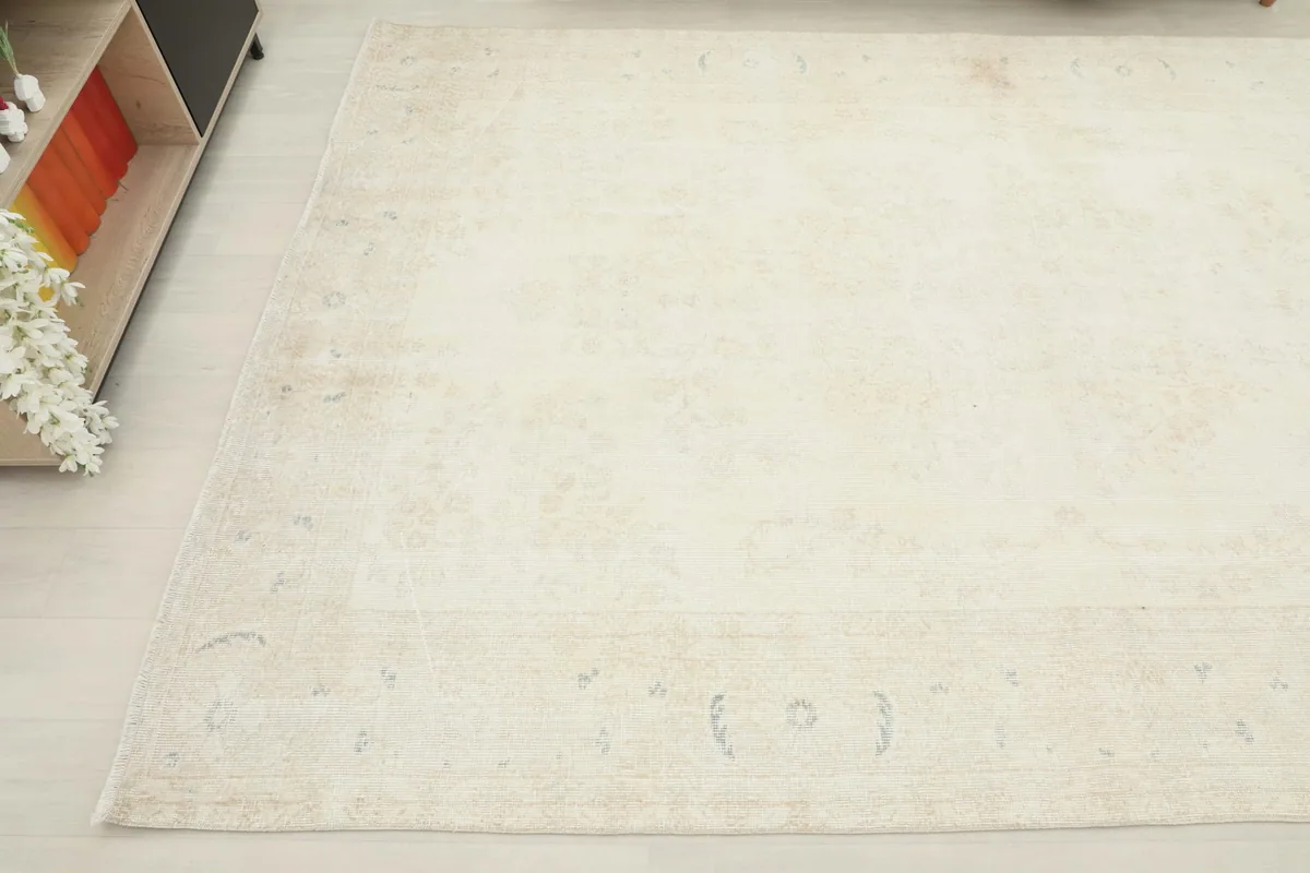 Angled view of the rug's surface, highlighting the soft, muted color transitions
