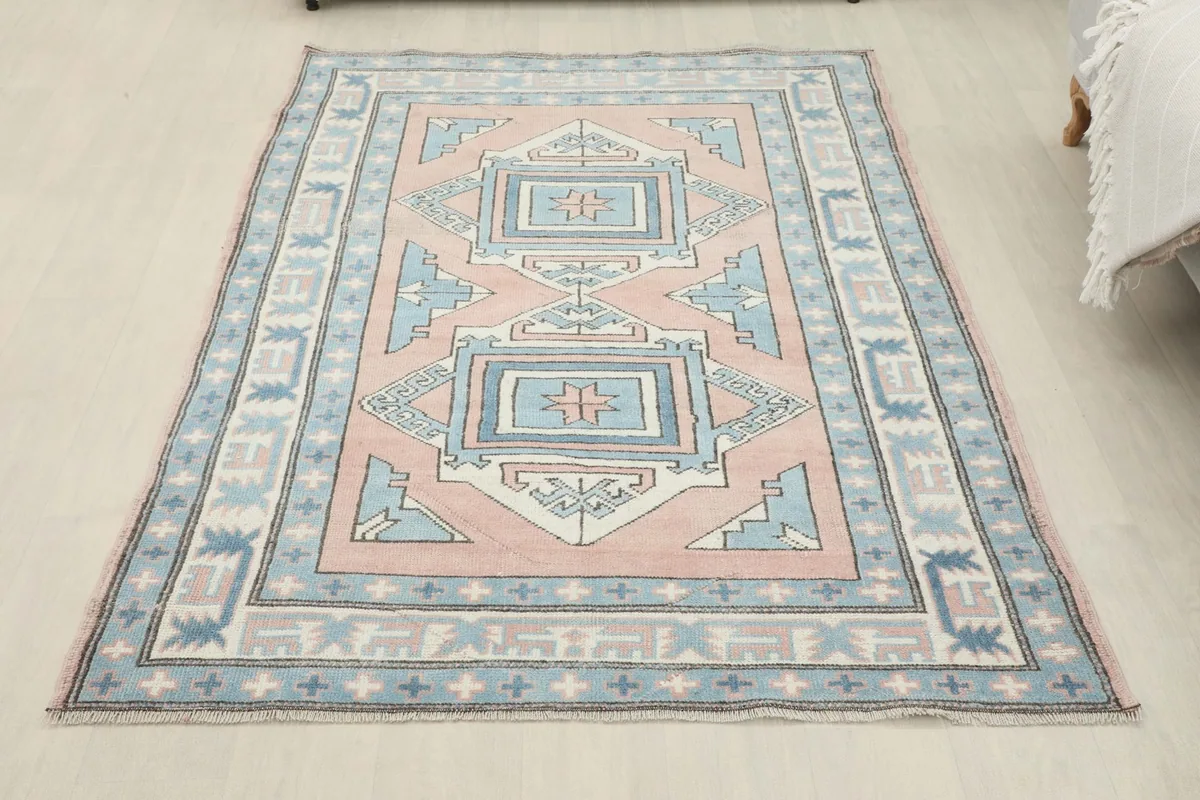 Full overhead view of the vintage Anatolian rug, showcasing its complete design and proportions.