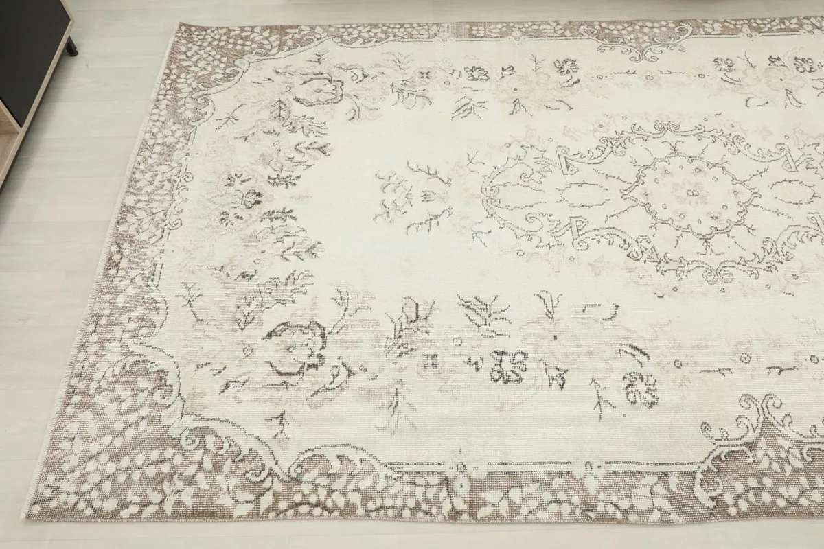 Another angled perspective of the large area rug, showing its full design and subtle color variations