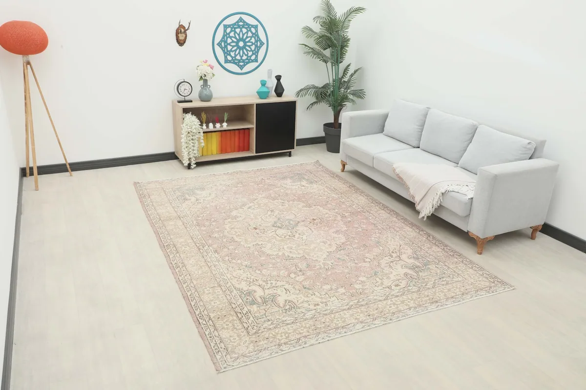 Vintage Anatolian rug displayed in a modern living room setting