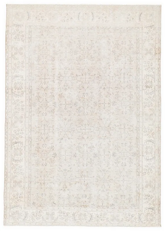 Full top view of the 6'7" x 10'2" ivory and beige vintage Anatolian rug with floral patterns