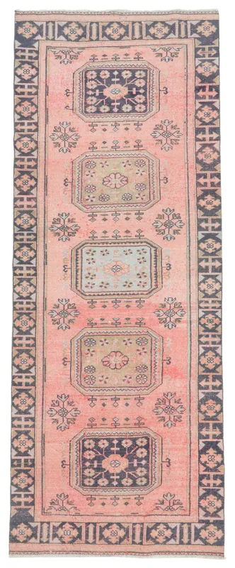Full overhead view of the 4'2" x 11'1" vintage Anatolian runner with a rose field and navy patterns