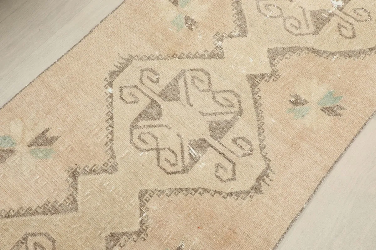 Detailed view of the central tribal geometric design and surrounding lighter areas