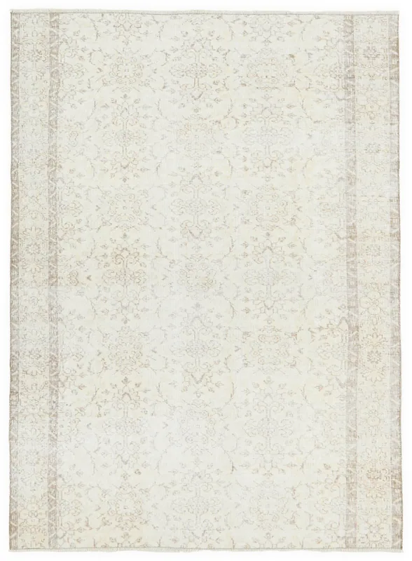 Full top view of the 5'3" x 7'7" ivory and beige Anatolian vintage rug on a white background.