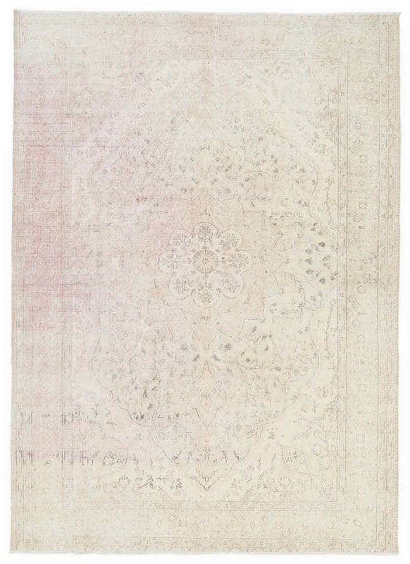 Top-down view of the 6'11" x 9'11" vintage Anatolian area rug with rose and ivory colors