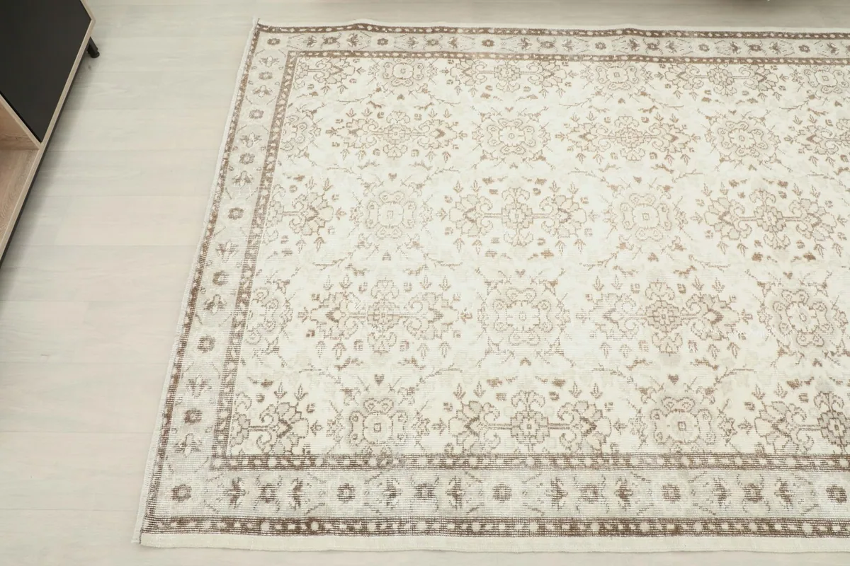 Close-up angled shot of the rug's design and color variations