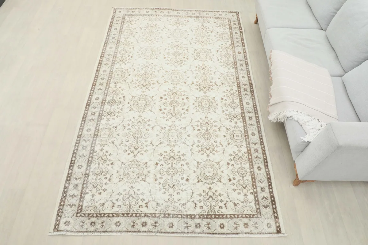 Overhead view of the vintage Anatolian rug in a room, showcasing its full design