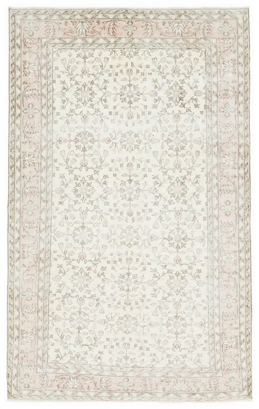 Full top view of the ivory and rose floral vintage Anatolian area rug