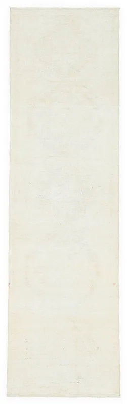 Full top view of the 3'0" x 10'8" ivory minimalist Anatolian runner on a white background.