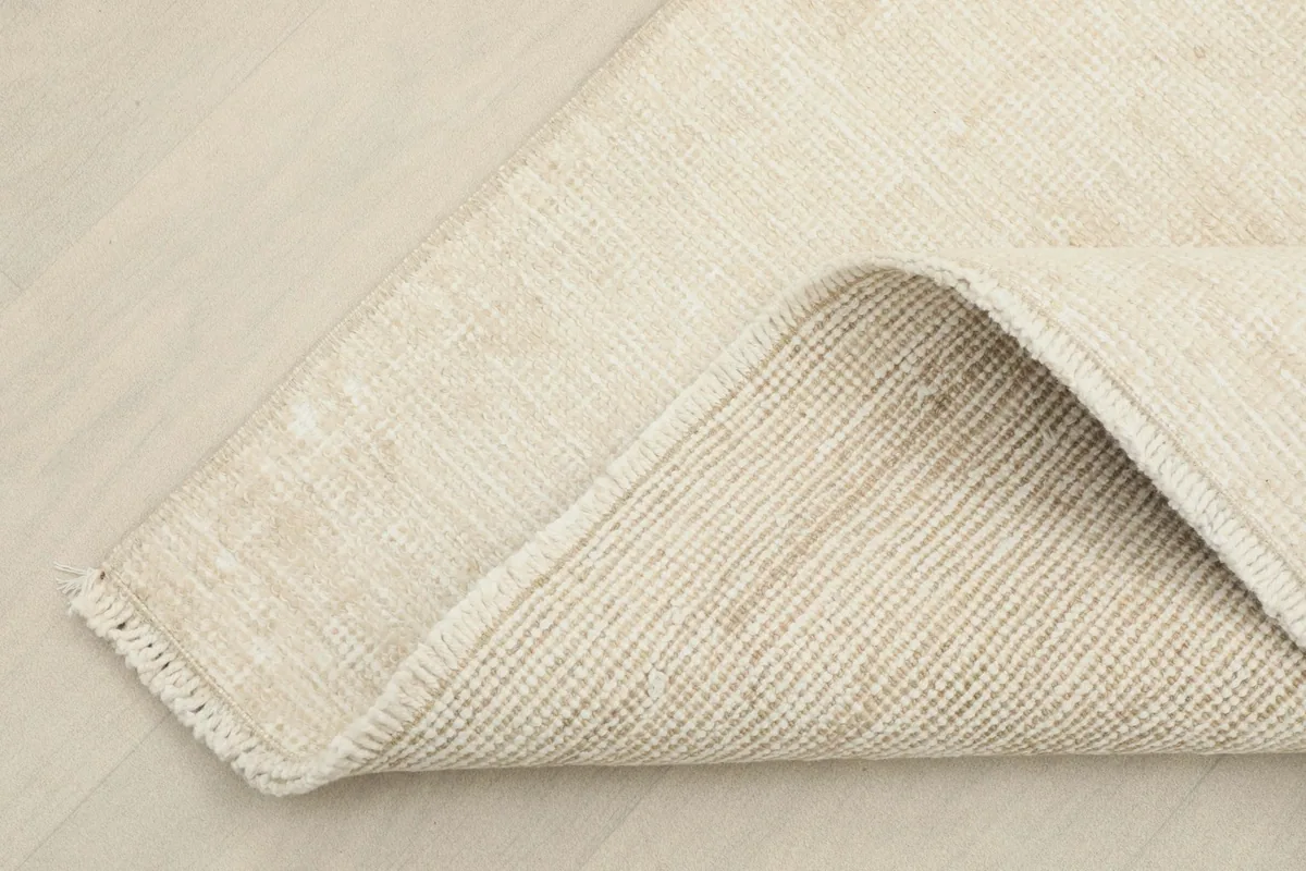 View of the reverse side of the runner, revealing the cotton foundation and hand-knotted construction.