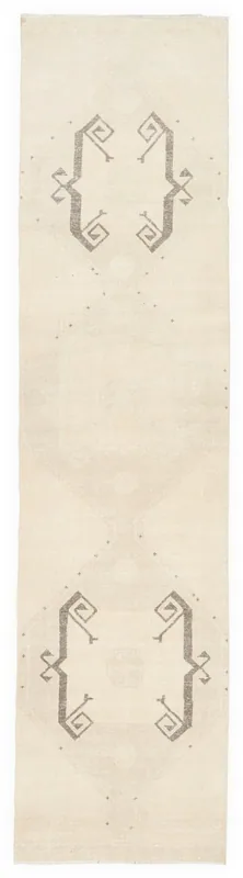Full top view of the 3'0" x 12'6" ivory and gray vintage Anatolian runner rug on a white background.