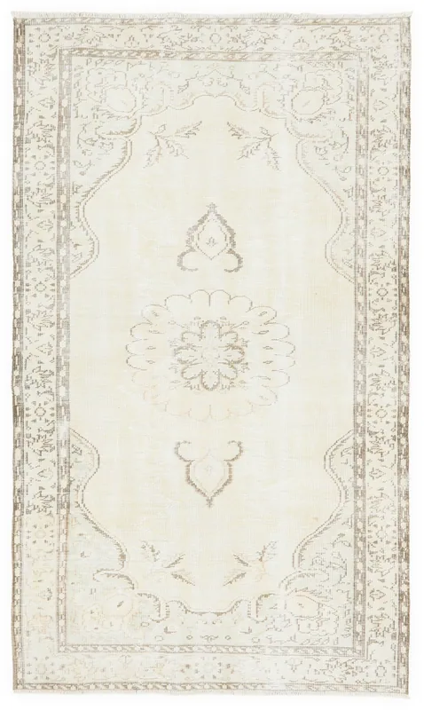 Full overhead view of the 5x8 ivory and gray vintage Anatolian rug on a white background.