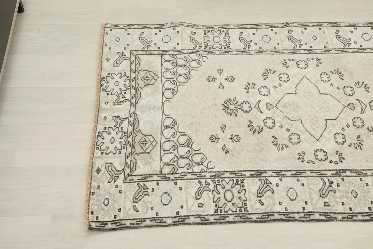Top-down angled view highlighting the geometric motifs and color variations