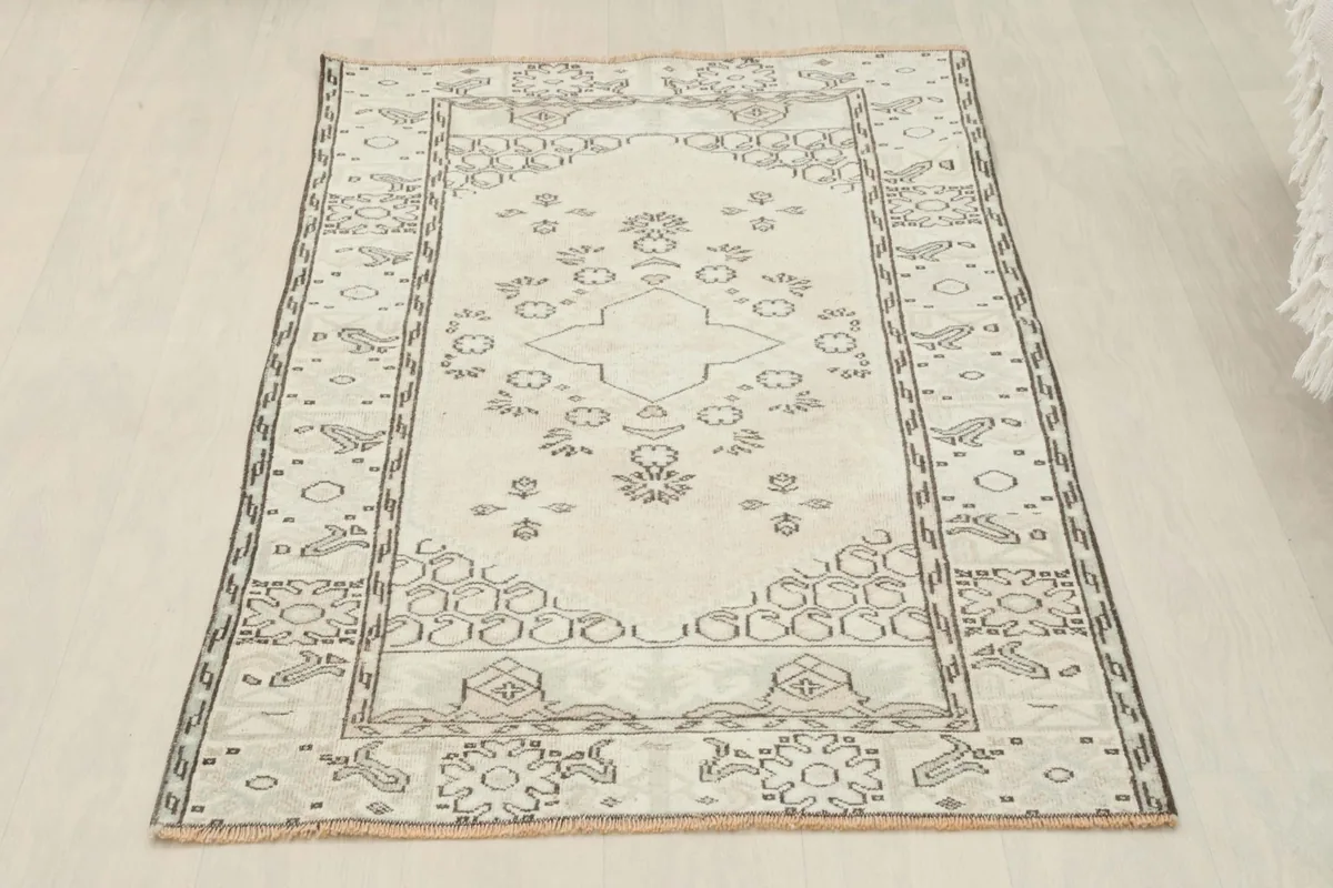 Full overhead view of the vintage Anatolian rug, slightly angled