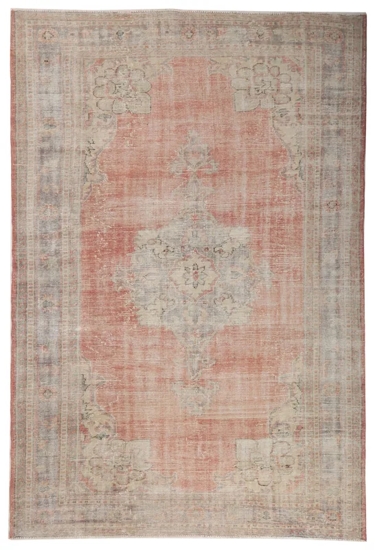 Full top view of the 7'3" x 10'10" vintage Anatolian area rug with a rose field and gray medallion