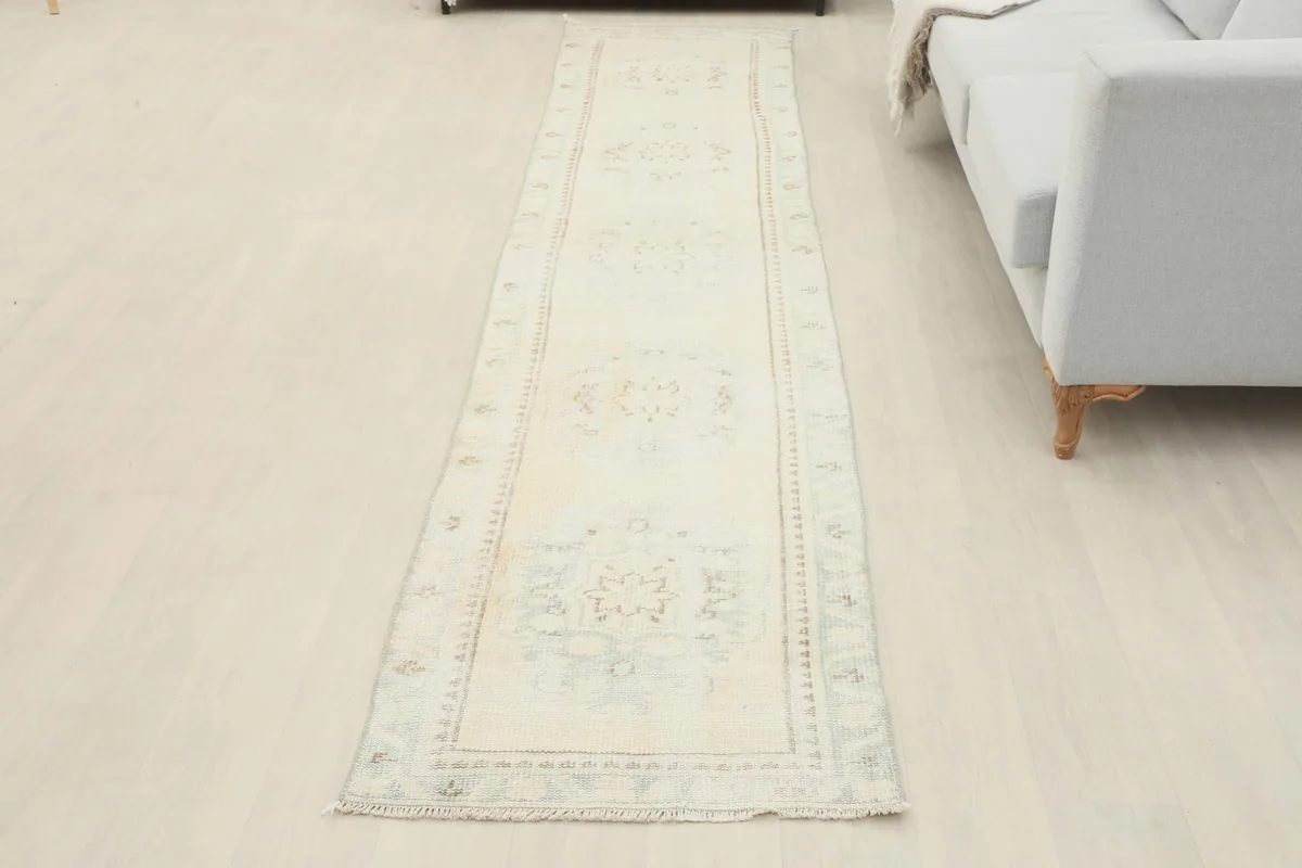 Overhead view of the back of the runner rug, showing the reverse side of the hand-knotted construction