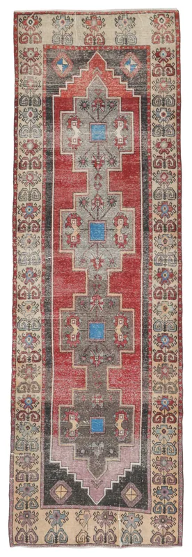 Full top view of the 4'0" x 12'6" vintage Anatolian runner with a red and gray geometric pattern